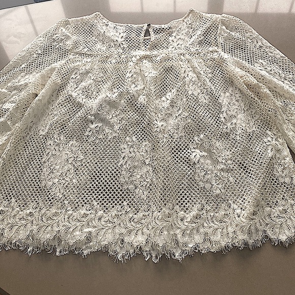 White long sleeve lace blouse with button detail on back. - Picture 2 of 5